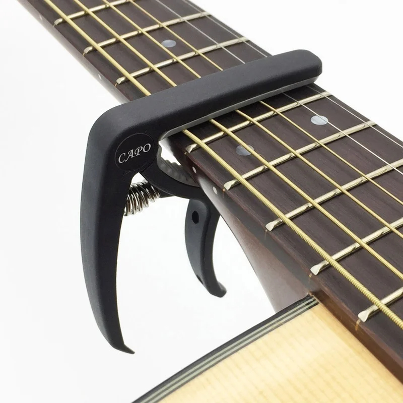 Plastic Guitar Capo for 6 Stri - đánh giá và giá Guitar Capo Clip